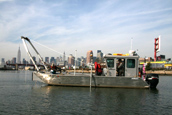 CR's custom-built survey & sampling vessel, R/V Lophius, conducting a geophysical survey in NYC