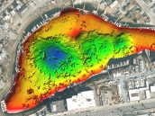 Scores of sunken vessels mapped with multibeam sonar in an urban basin.