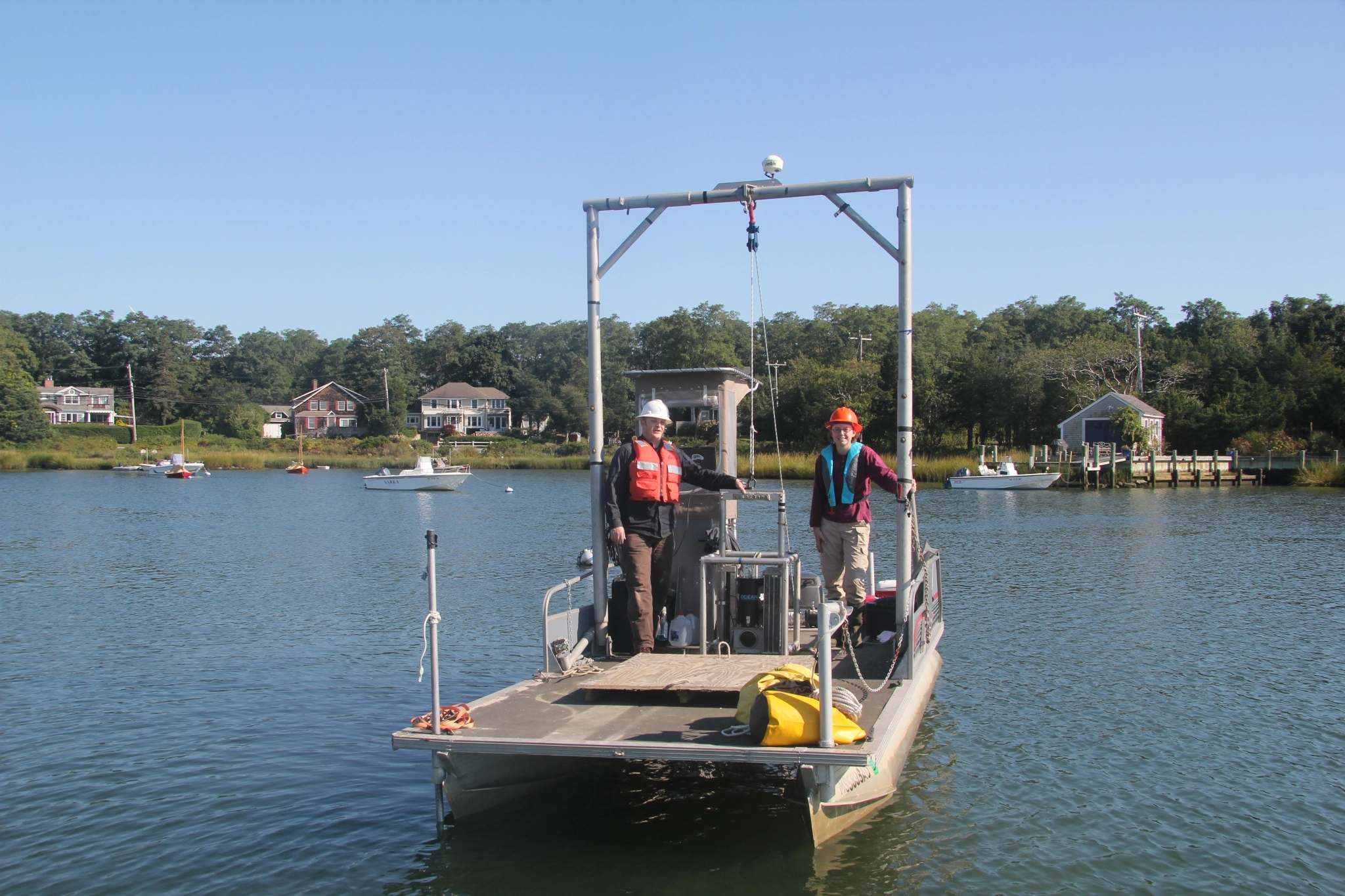 20-foot custom Pontoon Boat designed for shallow water vibracoring and sediment sampling