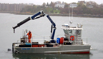 35 ft. aluminum mooring barge capable of oceanographic mooring deployments & vibracore operations in the Boston Harbor area